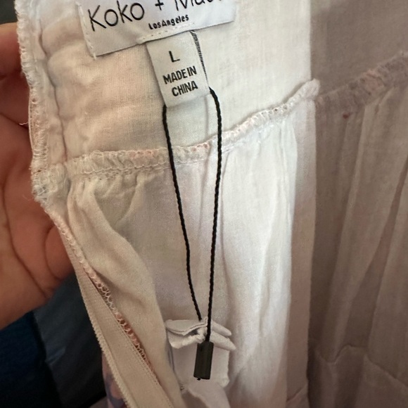 Nordstrom Ruffle Midi Dress
KOKO + MASON NWT Size Large - Picture 8 of 9